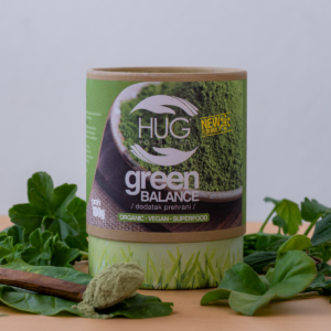 Kutija Hug Your Life proizvoda Green Balance New Formula na stolu